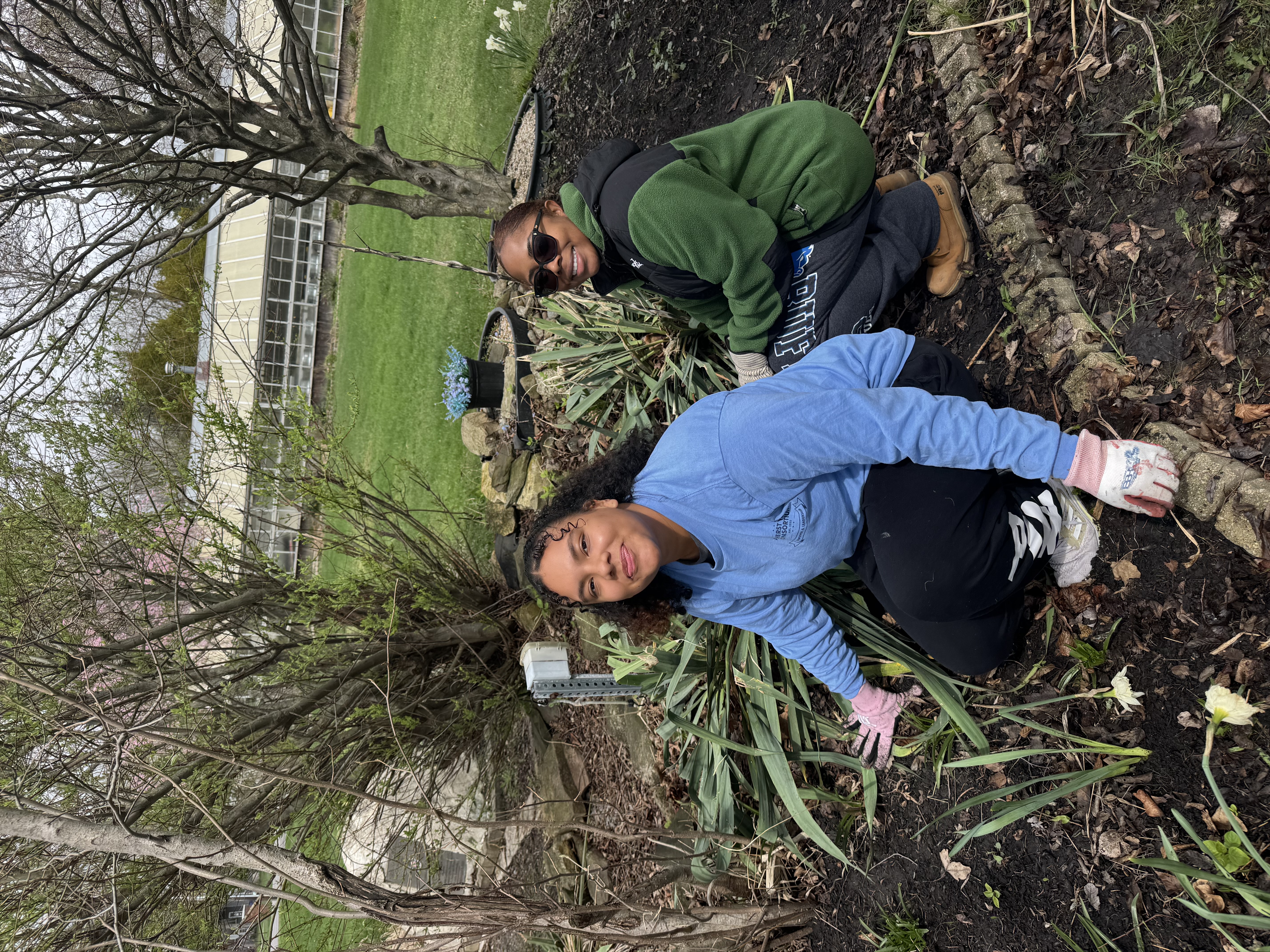 Students helping with Ryan's Garden cleanup